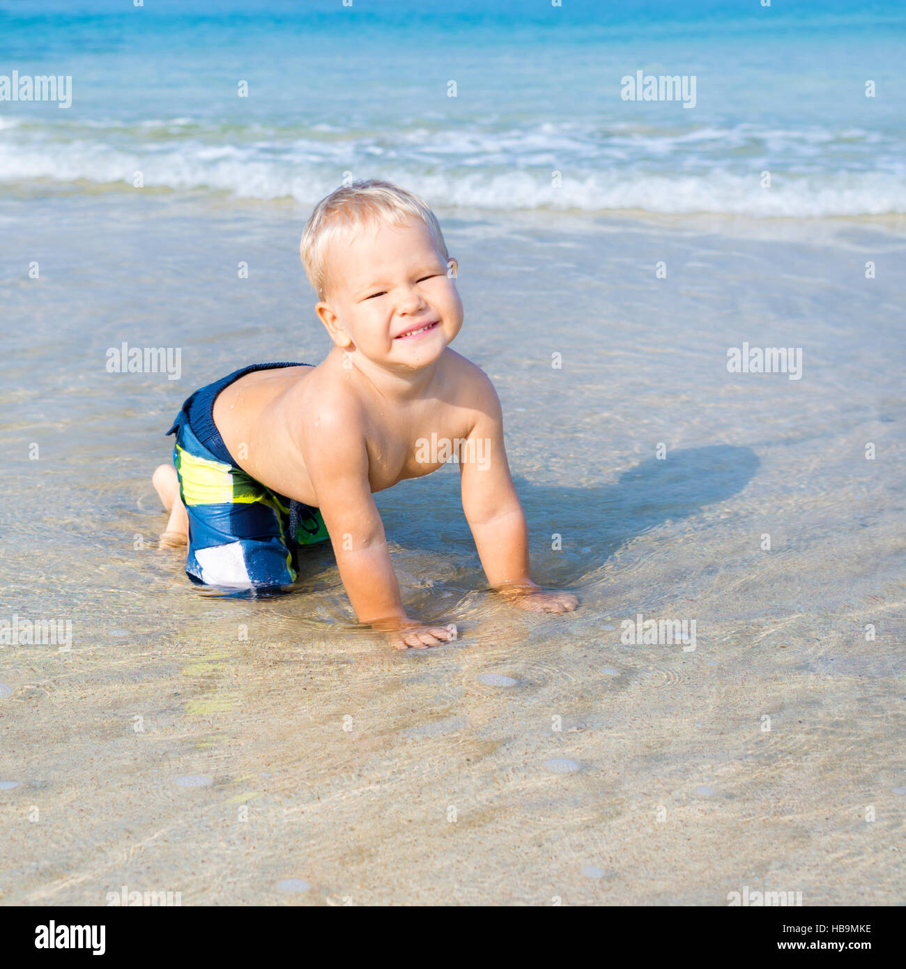 Baby in a sea Stock Photo