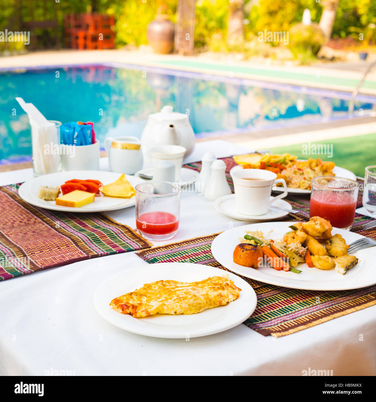 Breakfast near a swimming pool Stock Photo Alamy