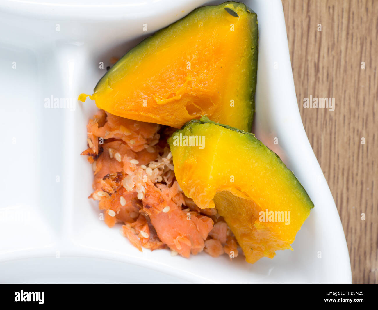 Japanese cuisine, simmered pumpkin on the white plate Stock Photo