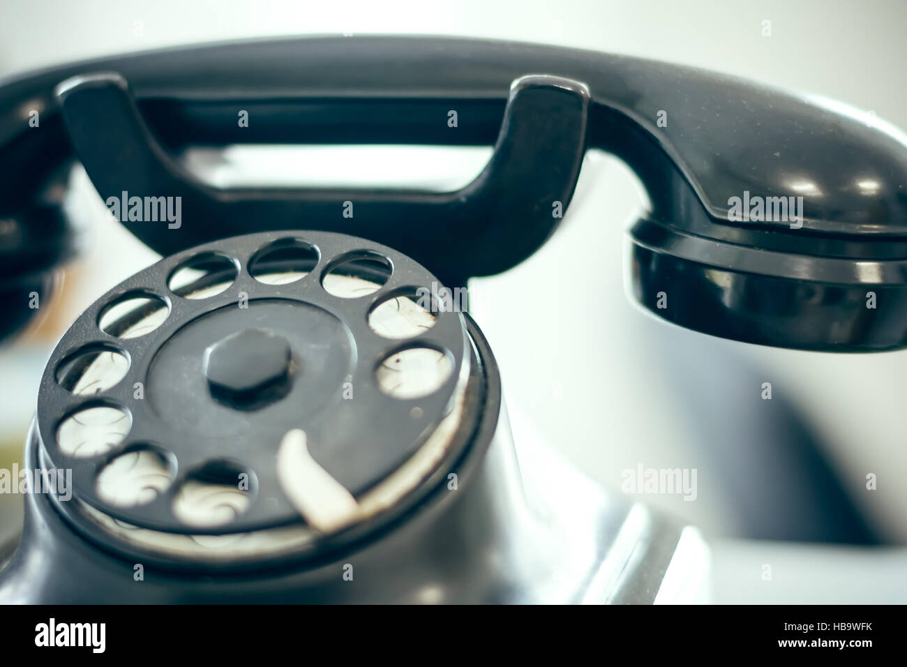old telephone with rotary disc Stock Photo