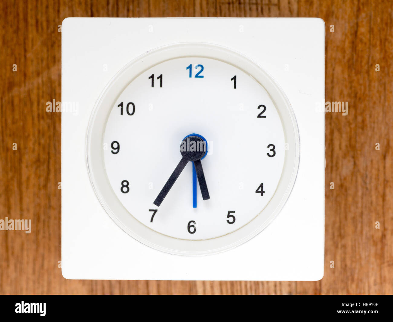 The second series of the sequence of time on the simple white analog clock , 45/96 Stock Photo