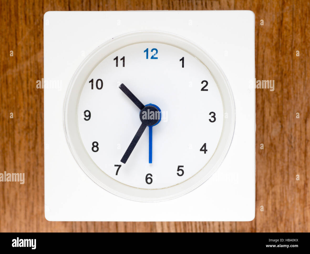 The second series of the sequence of time on the simple white analog clock , 85/96 Stock Photo