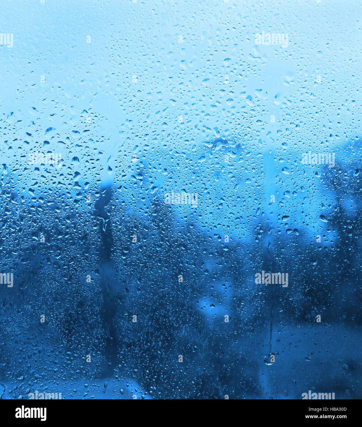 Natural drops of water on window glass Stock Photo