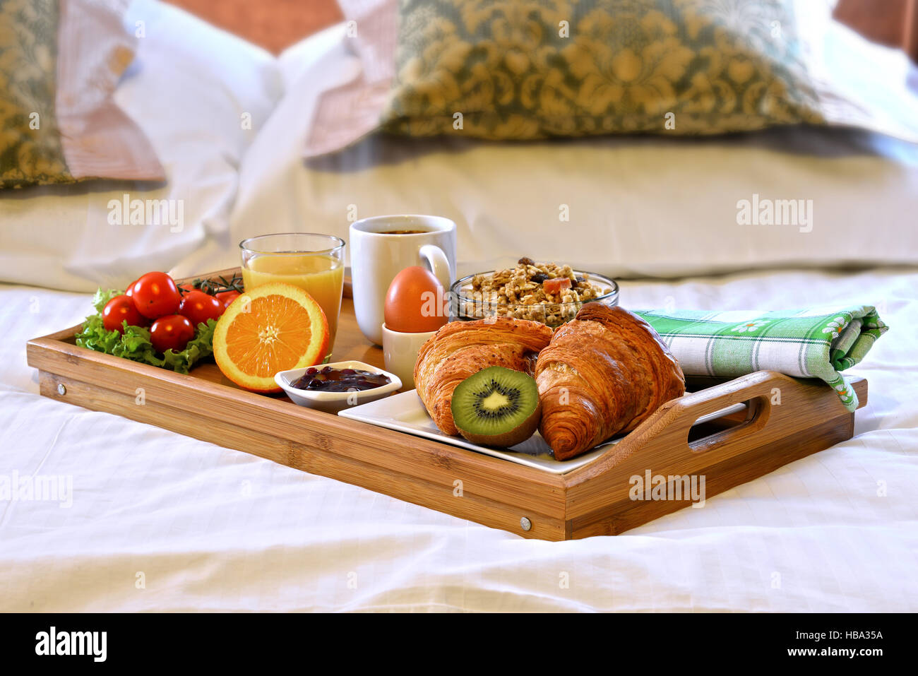 Breakfast tray in bed in hotel room Stock Photo - Alamy