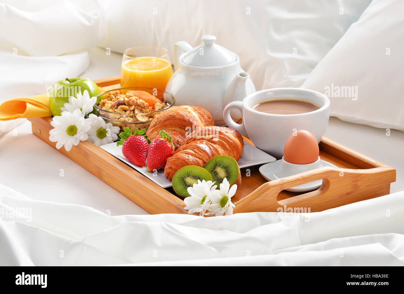 Breakfast tray in bed in hotel room Stock Photo - Alamy