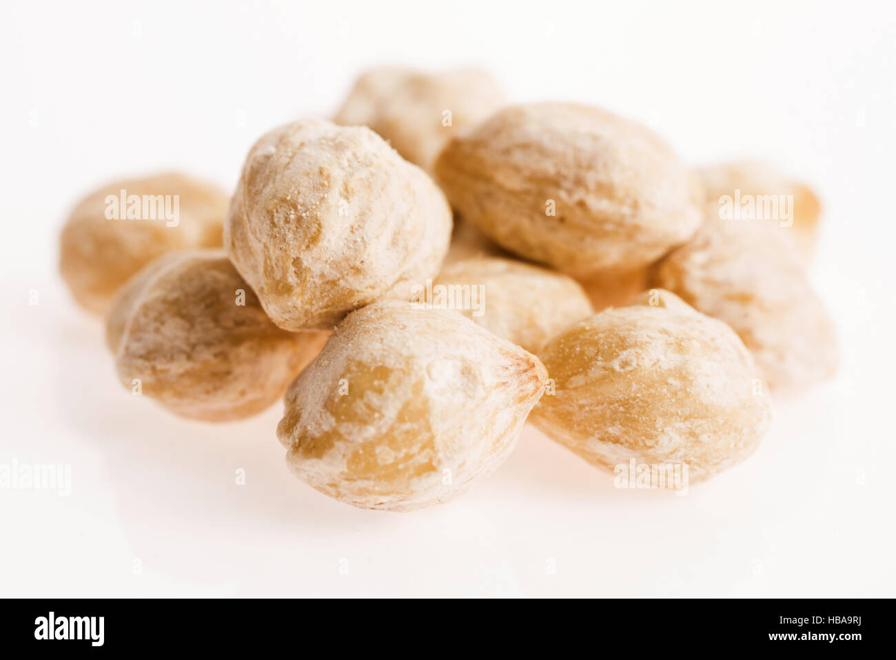 Candlenut is a spice in indonesian cuisine hires stock photography and