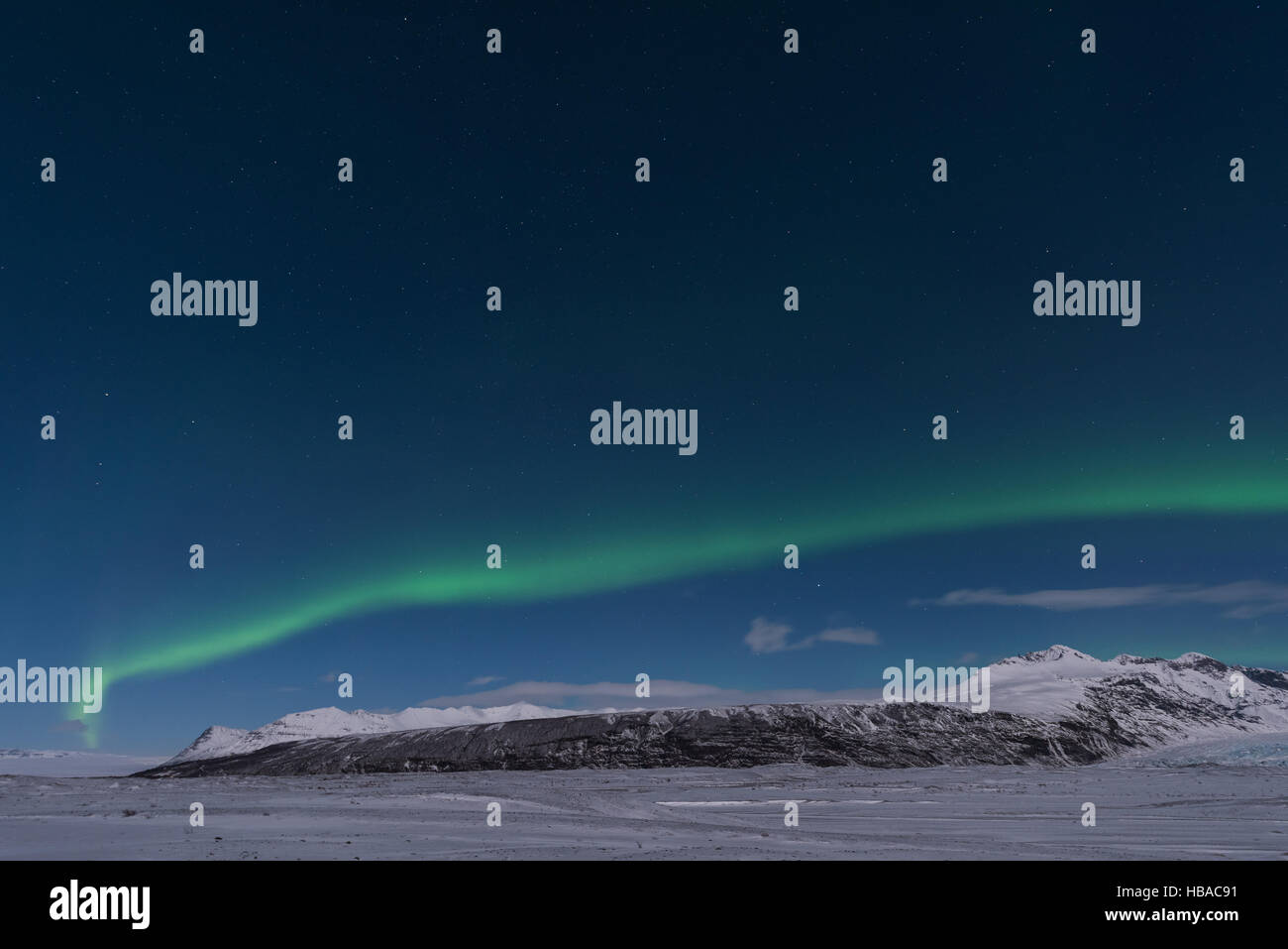 polar lights across Iceland mountains Stock Photo