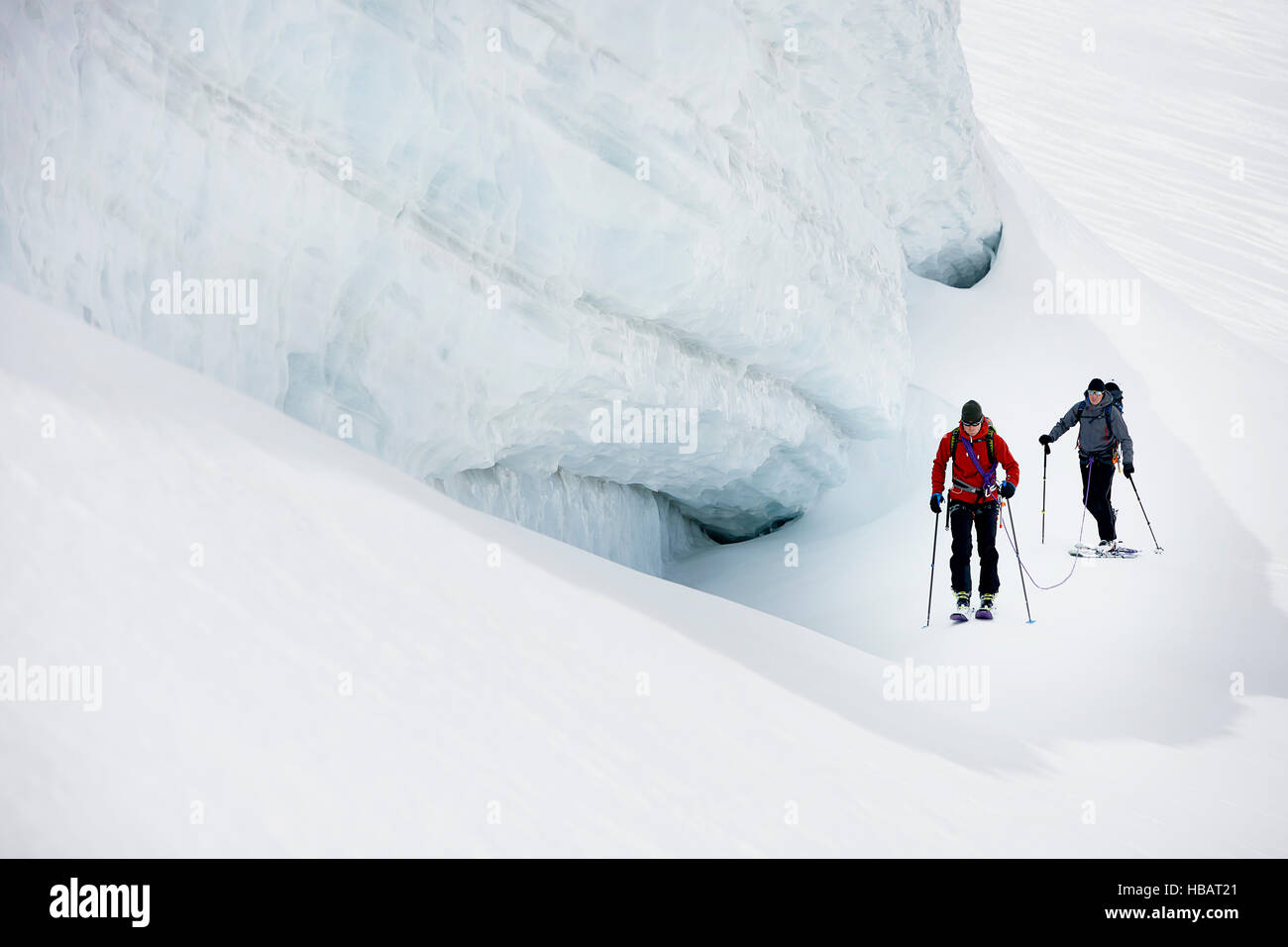 Mountaineers ski touring on snow-covered mountain, Saas Fee, Switzerland Stock Photo