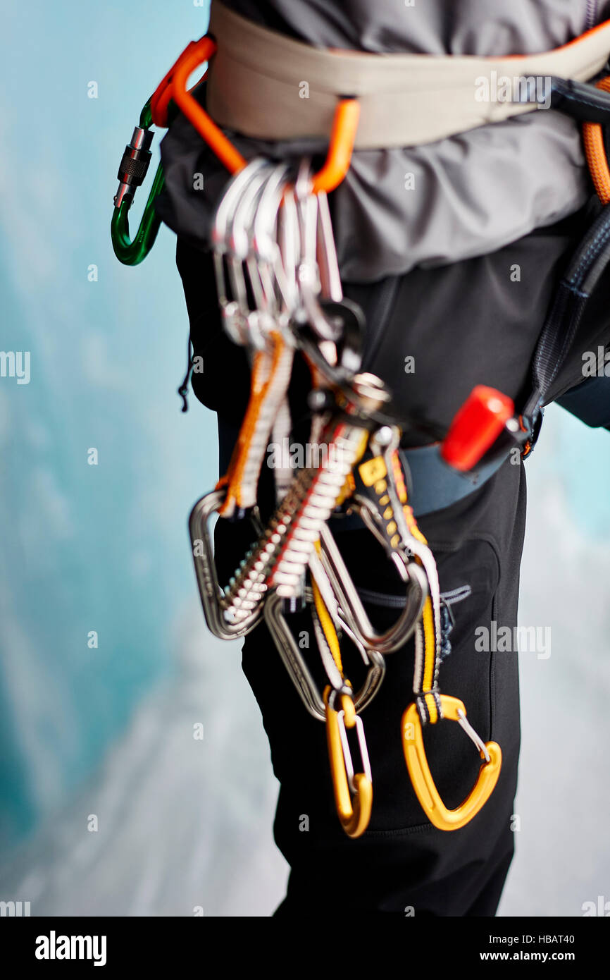 Cropped close up of carabiners on climbers harness Stock Photo