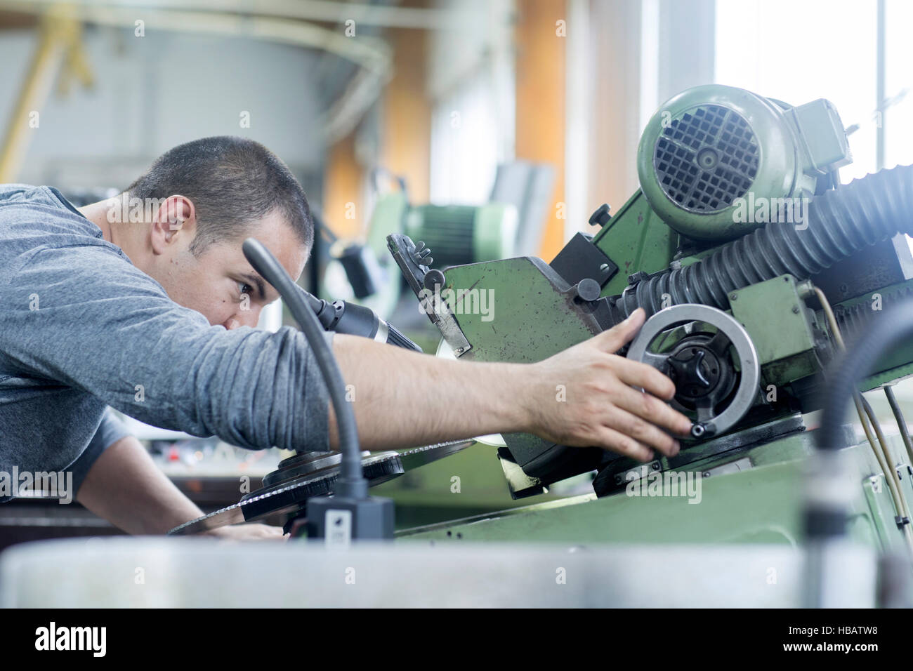 Man working in grinding Stock Photo Alamy