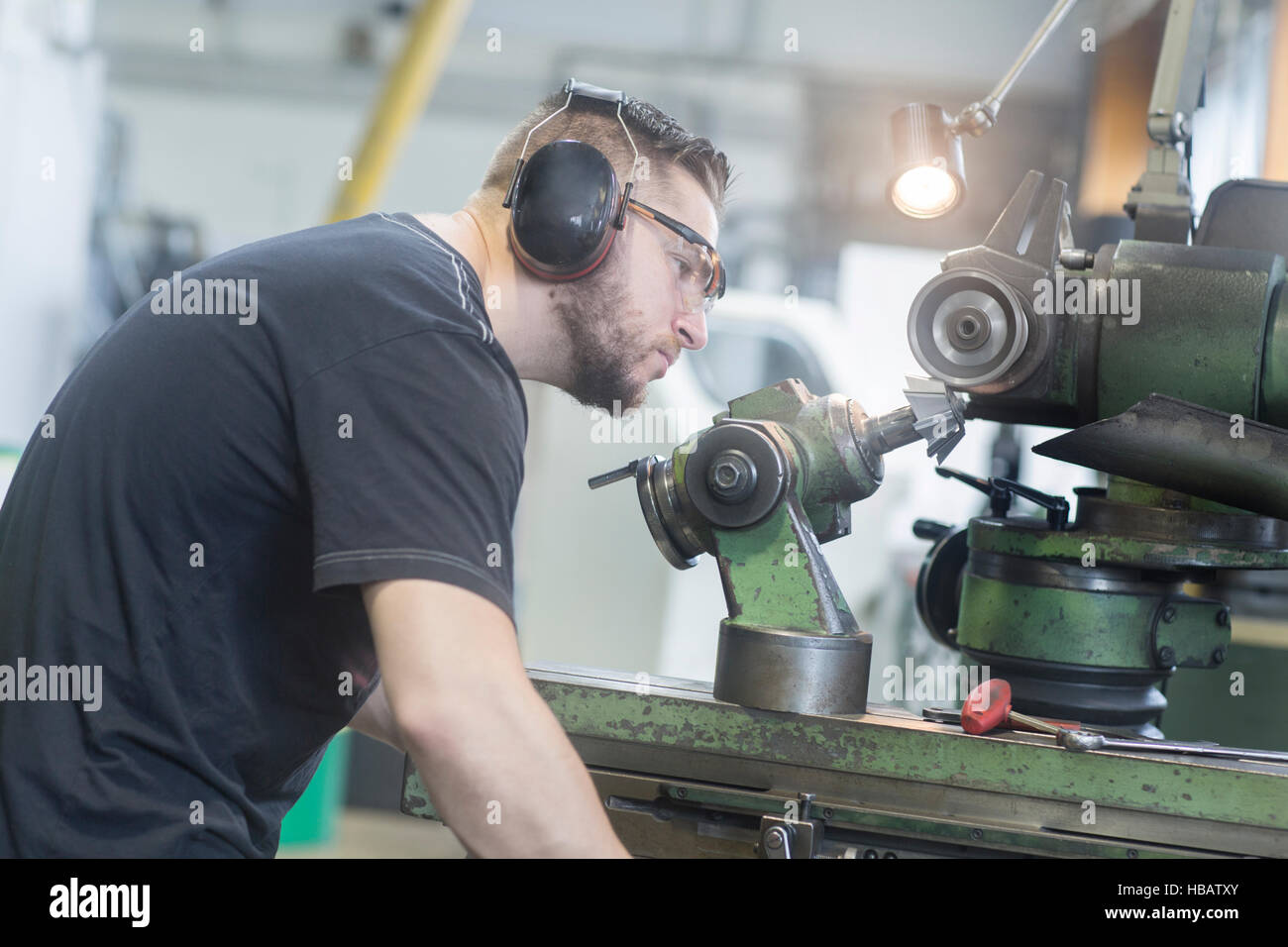 Man working in grinding Stock Photo Alamy