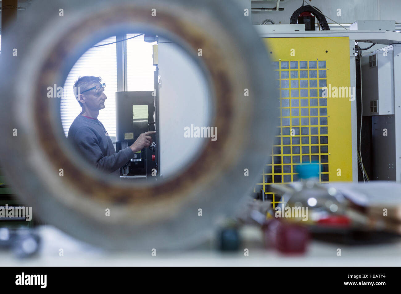 Man working in grinding Stock Photo Alamy