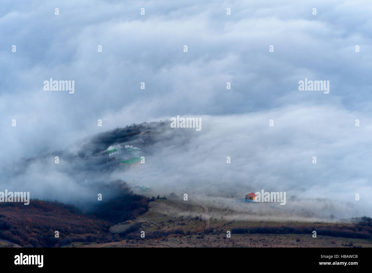 View of dispersing mountain mist from Luchistoye Village, South Demergi mountain, Crimea, Ukraine Stock Photo