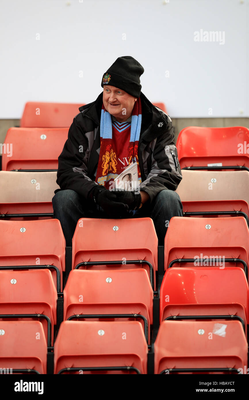 A Burnley fan in the stands Stock Photo