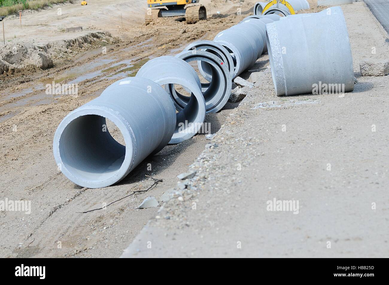 Spun concrete pipe at the construction site Stock Photo