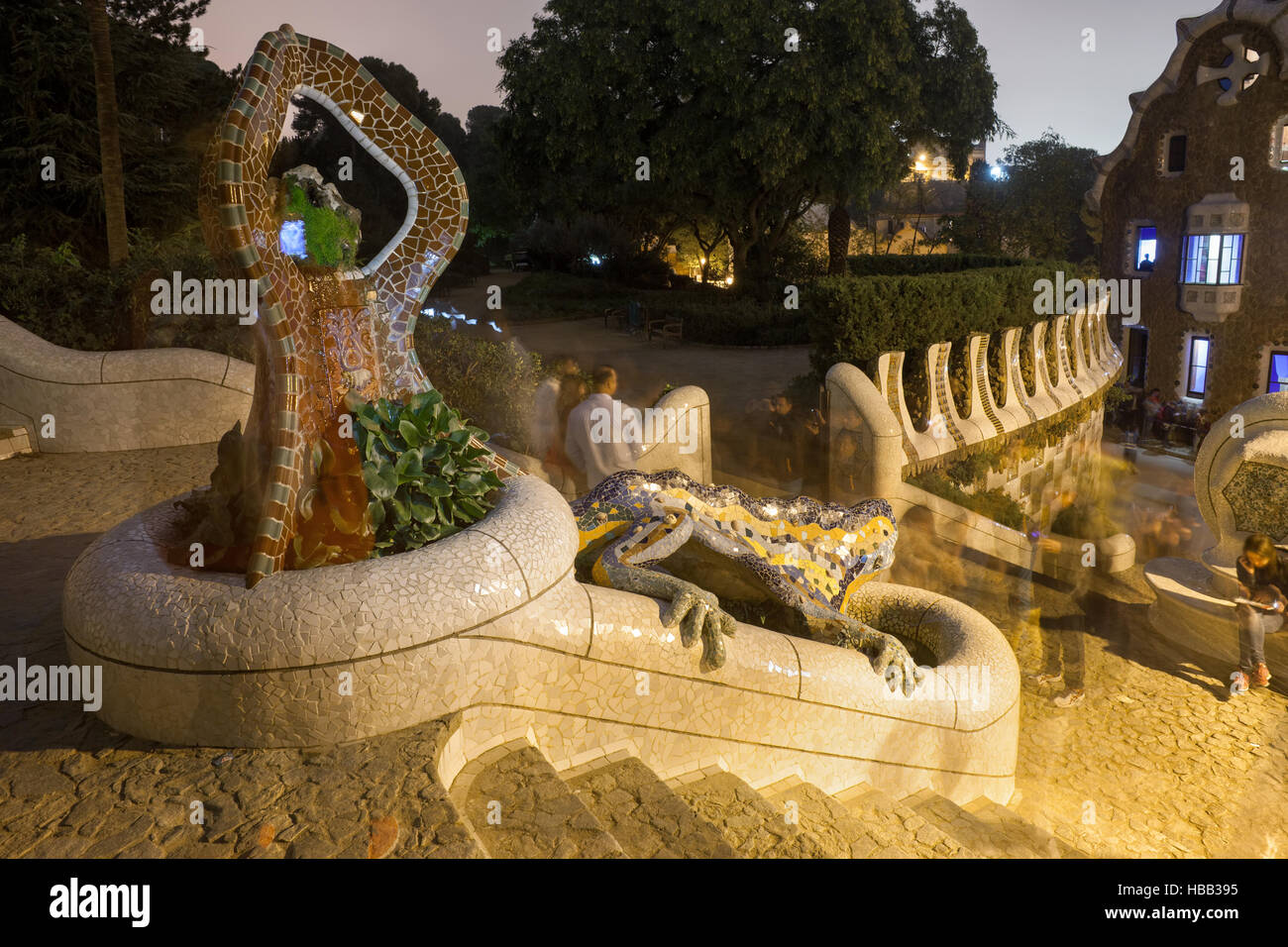 Spain, Barcelona, Park Guell at night, The Dragon fountain, mosaic covered salamander Stock Photo