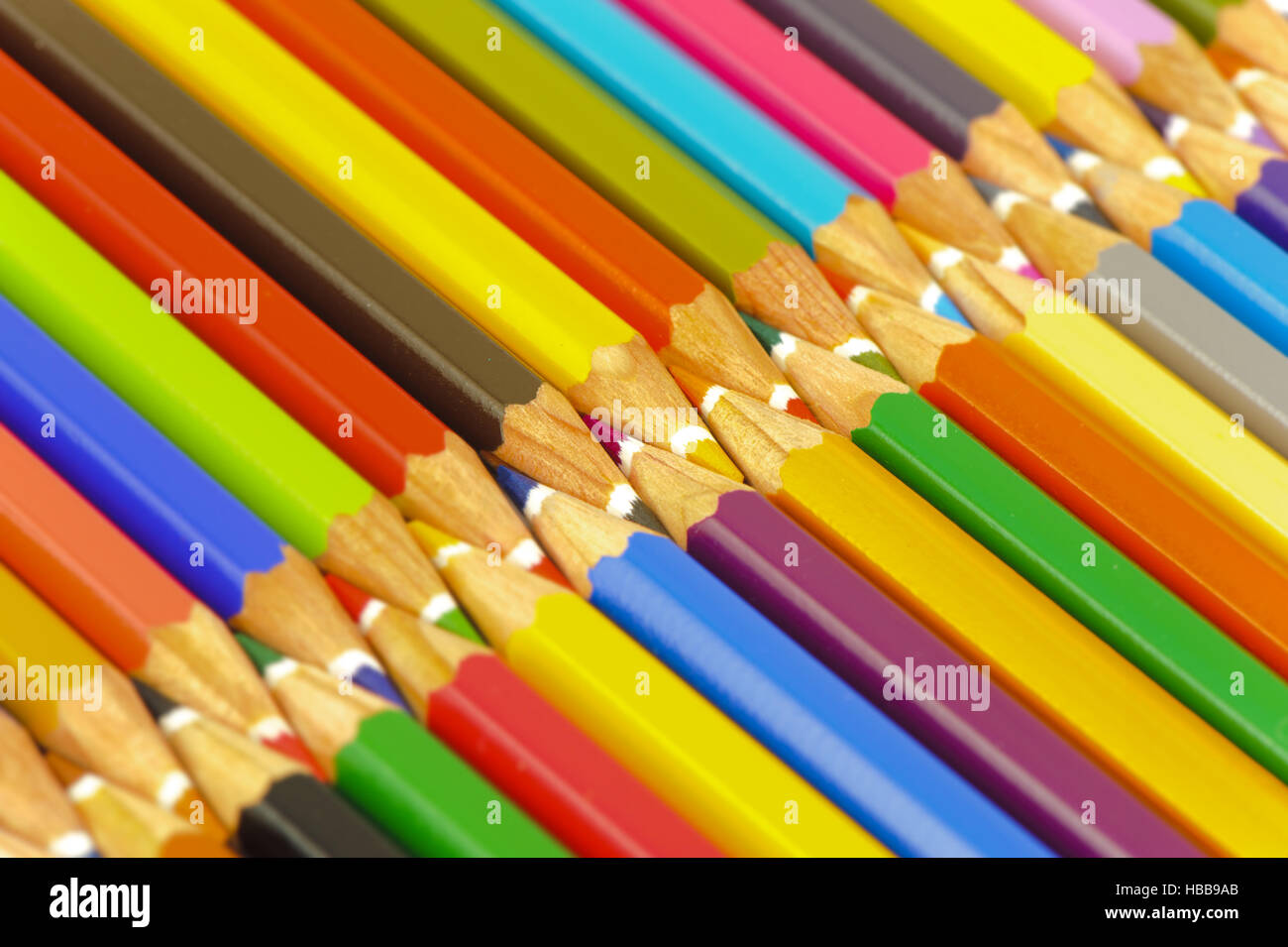 crayons show symbolic teamwork as zipper Stock Photo