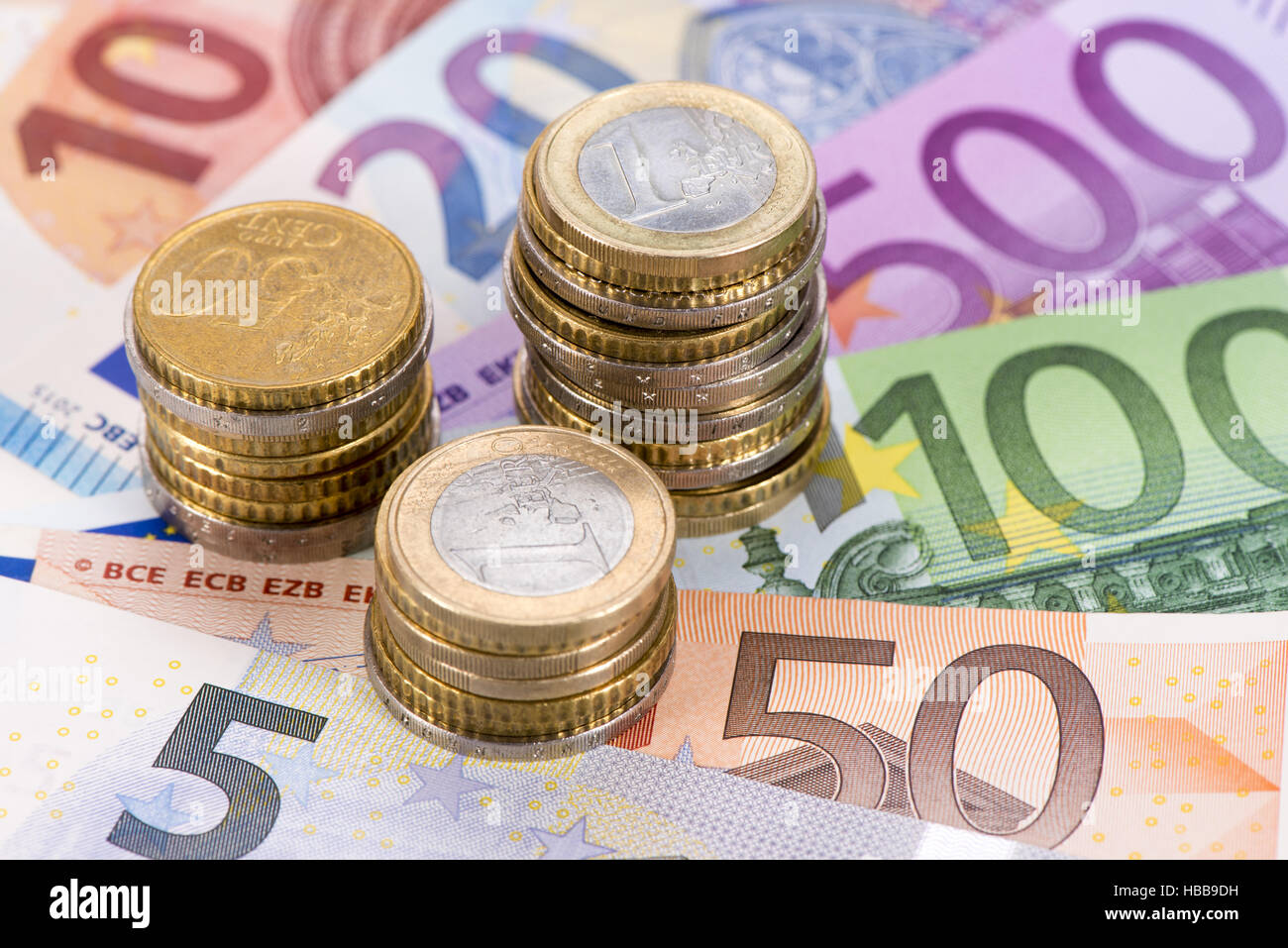 euro banknotes with coins Stock Photo
