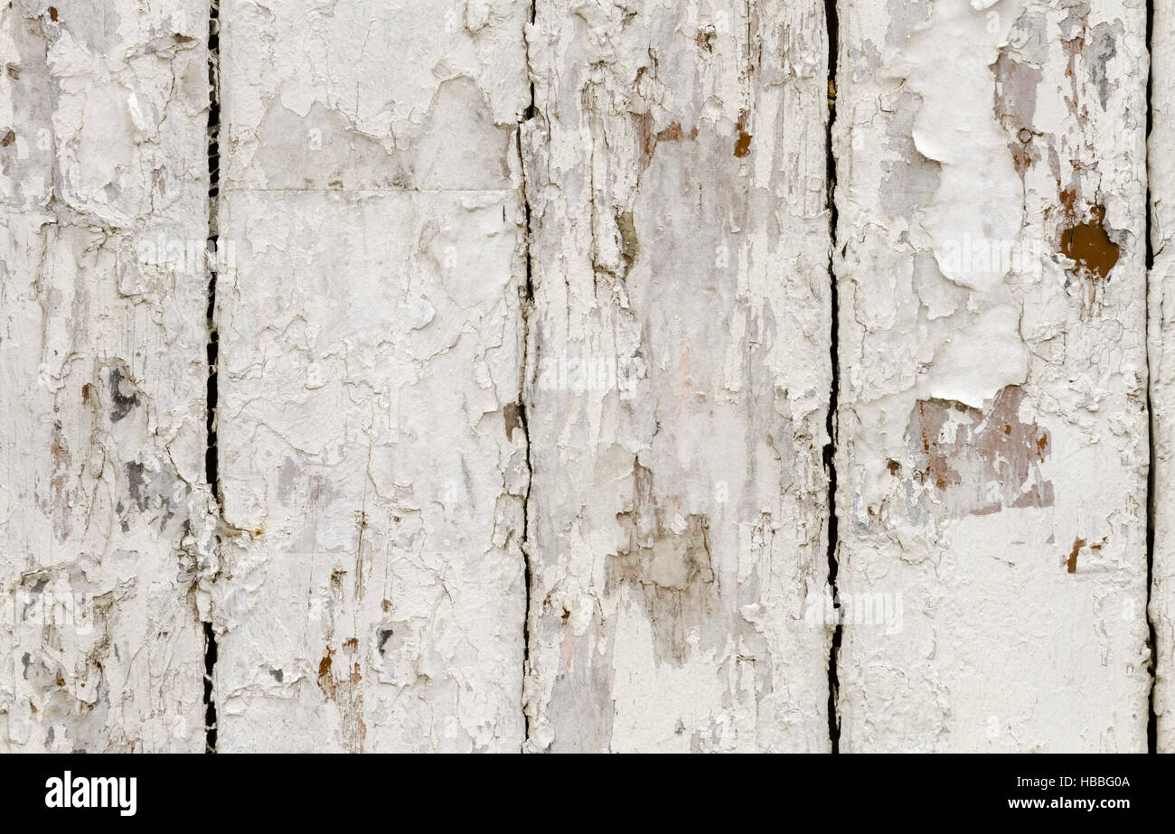 Timber Flaking old flaking wooden wall Stock Photo - Alamy