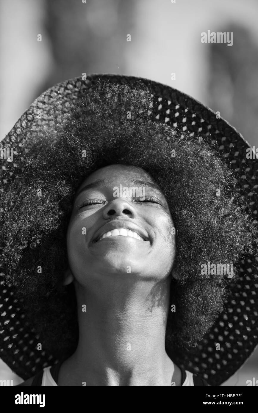 Close up portrait of a beautiful young african american woman smiling ...