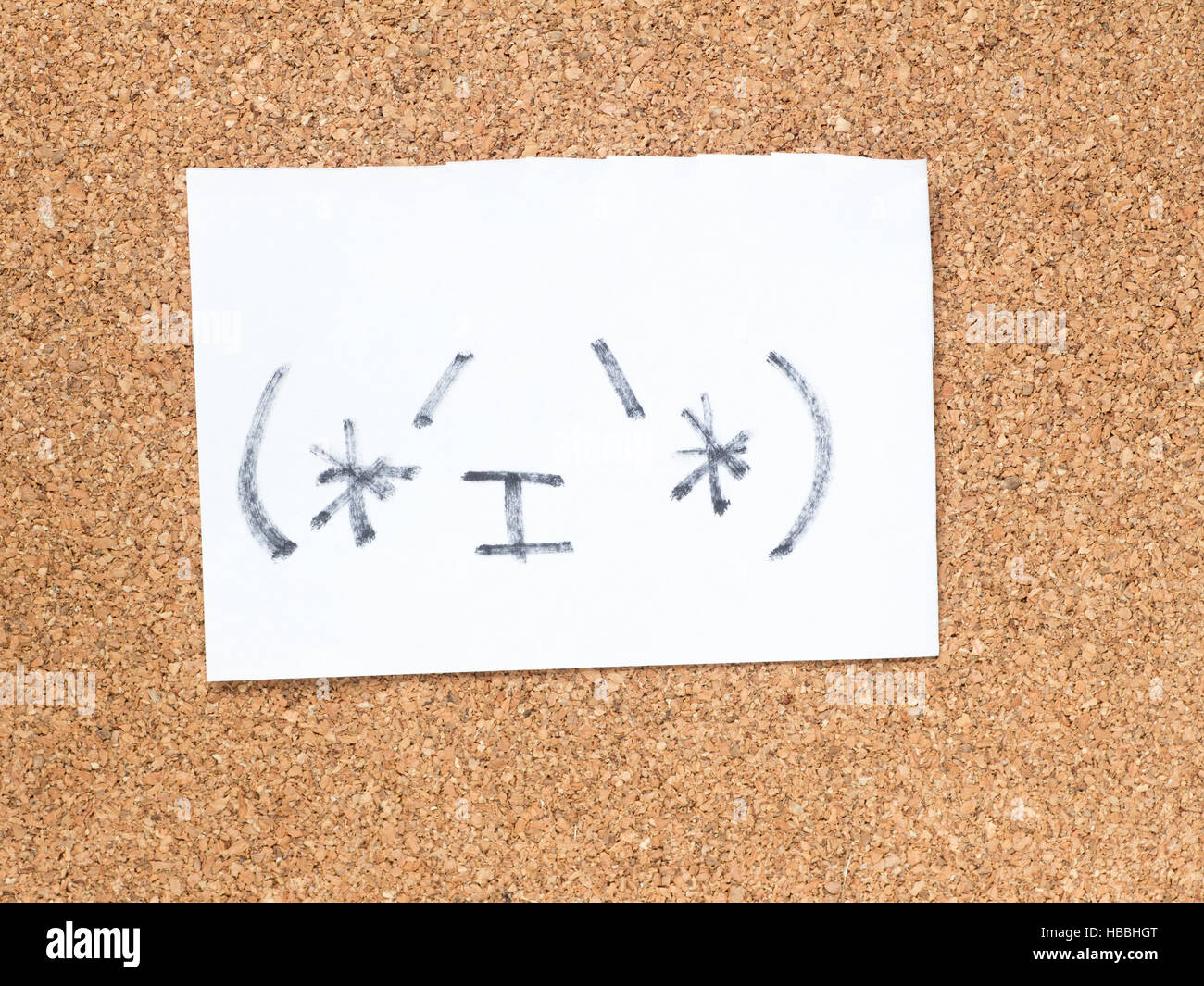 The series of Japanese emoticons called Kaomoji on the cork board, content Stock Photo