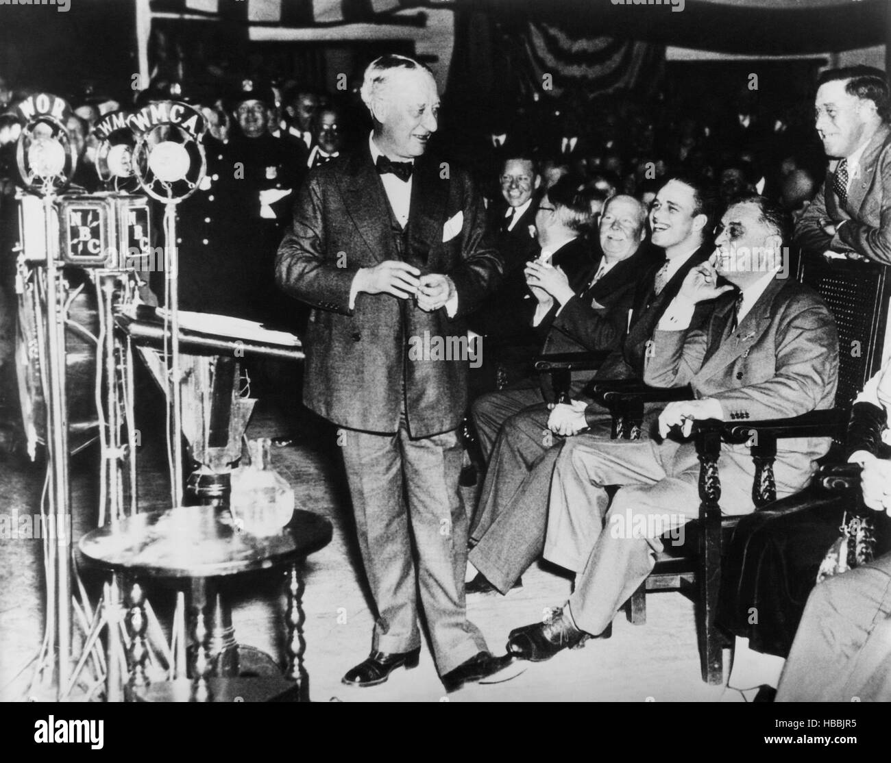 Future President Franklin D. Roosevelt (sitting, right), and former New York Governor Al Smith (left), at a Democratic rally in Stock Photo