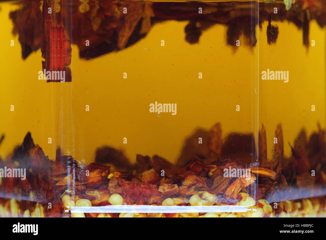 chili flakes in olive oil Stock Photo Alamy