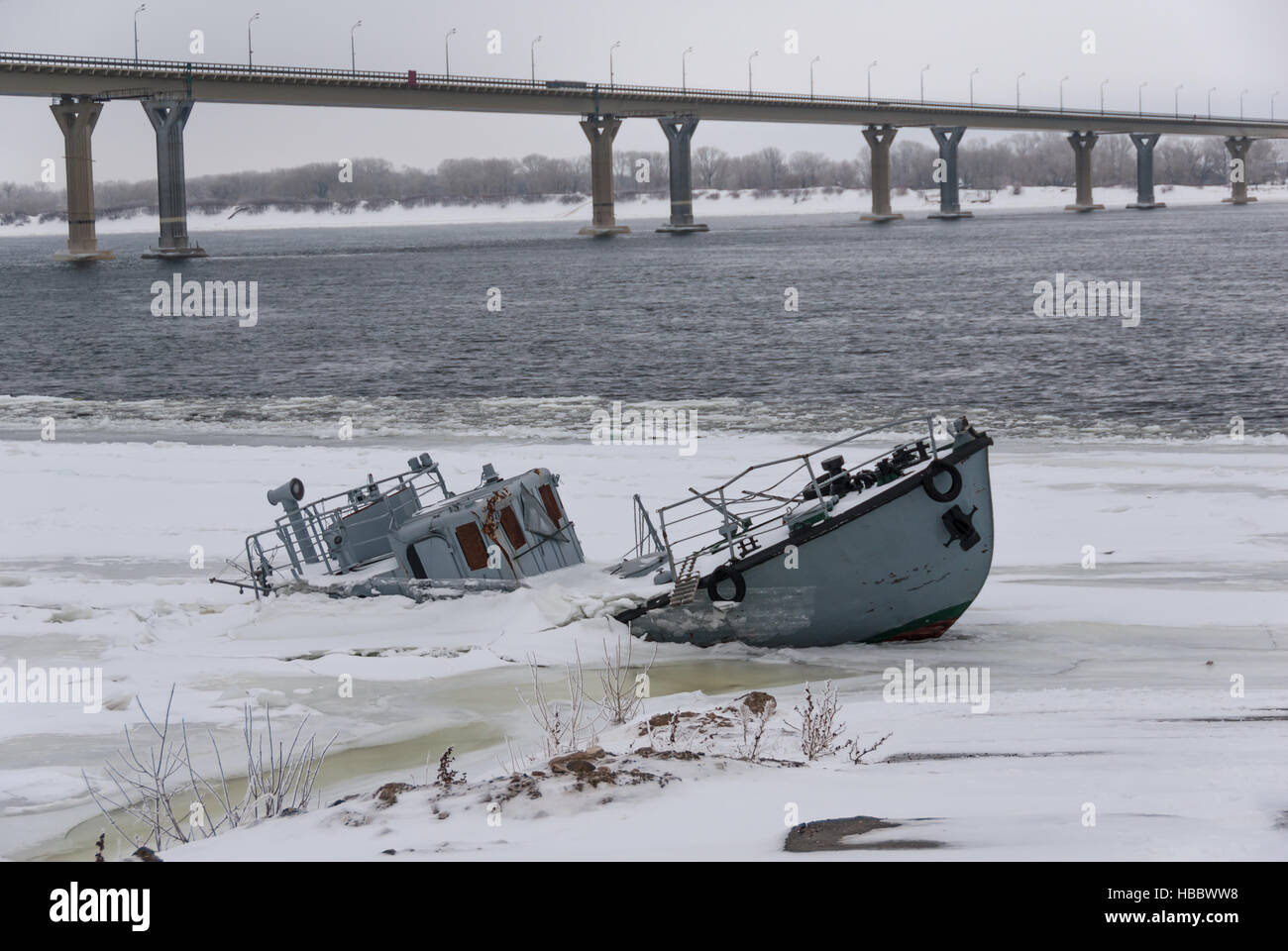 Sunken ship in a frozen river Stock Photo