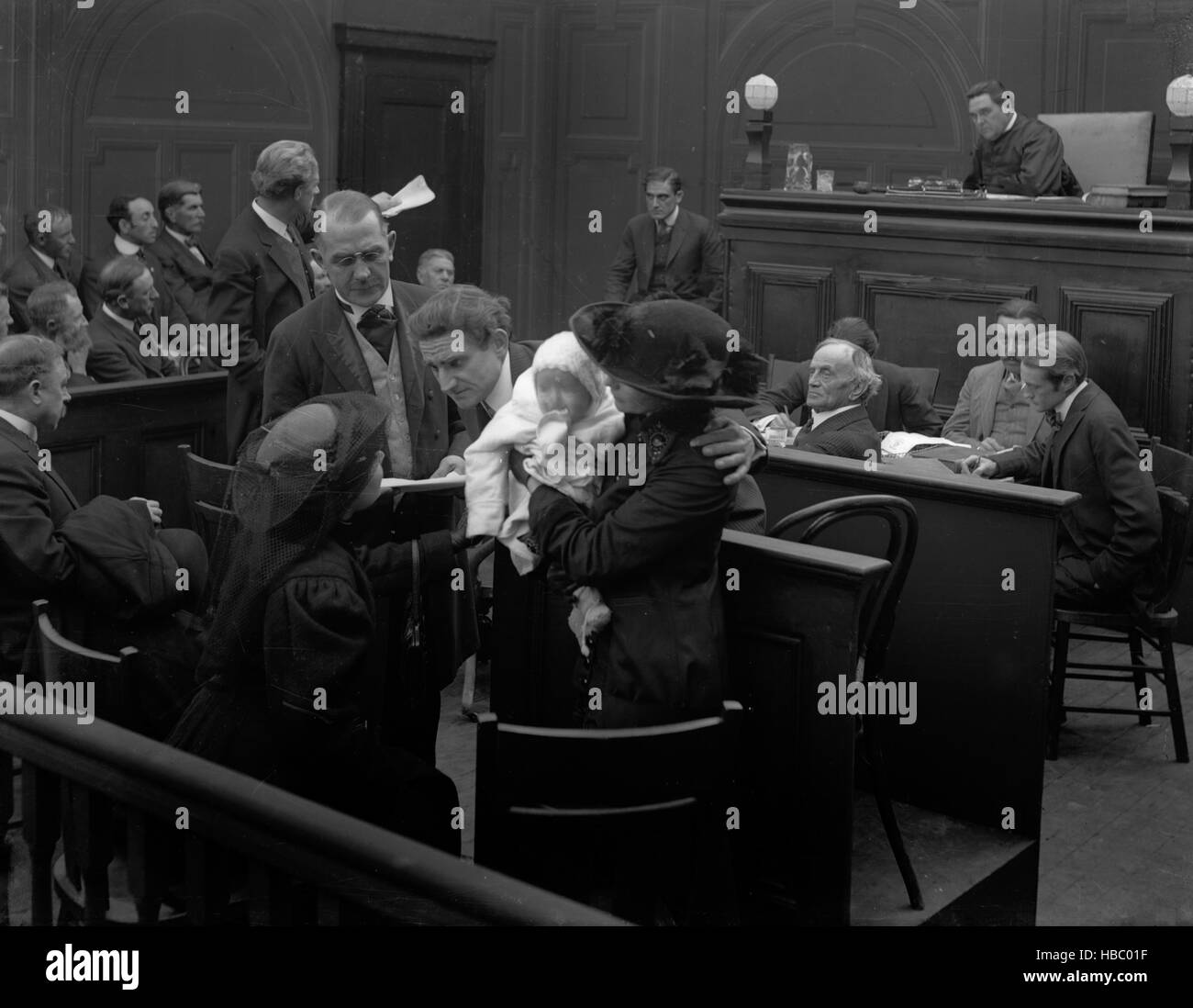 1910s 1920s DRAMATIC COURT ROOM SCENE SILENT MOVIE STILL - 01/01/1910 - Photo by: AMERICAN STOCK/H. Roberts Stock Photo