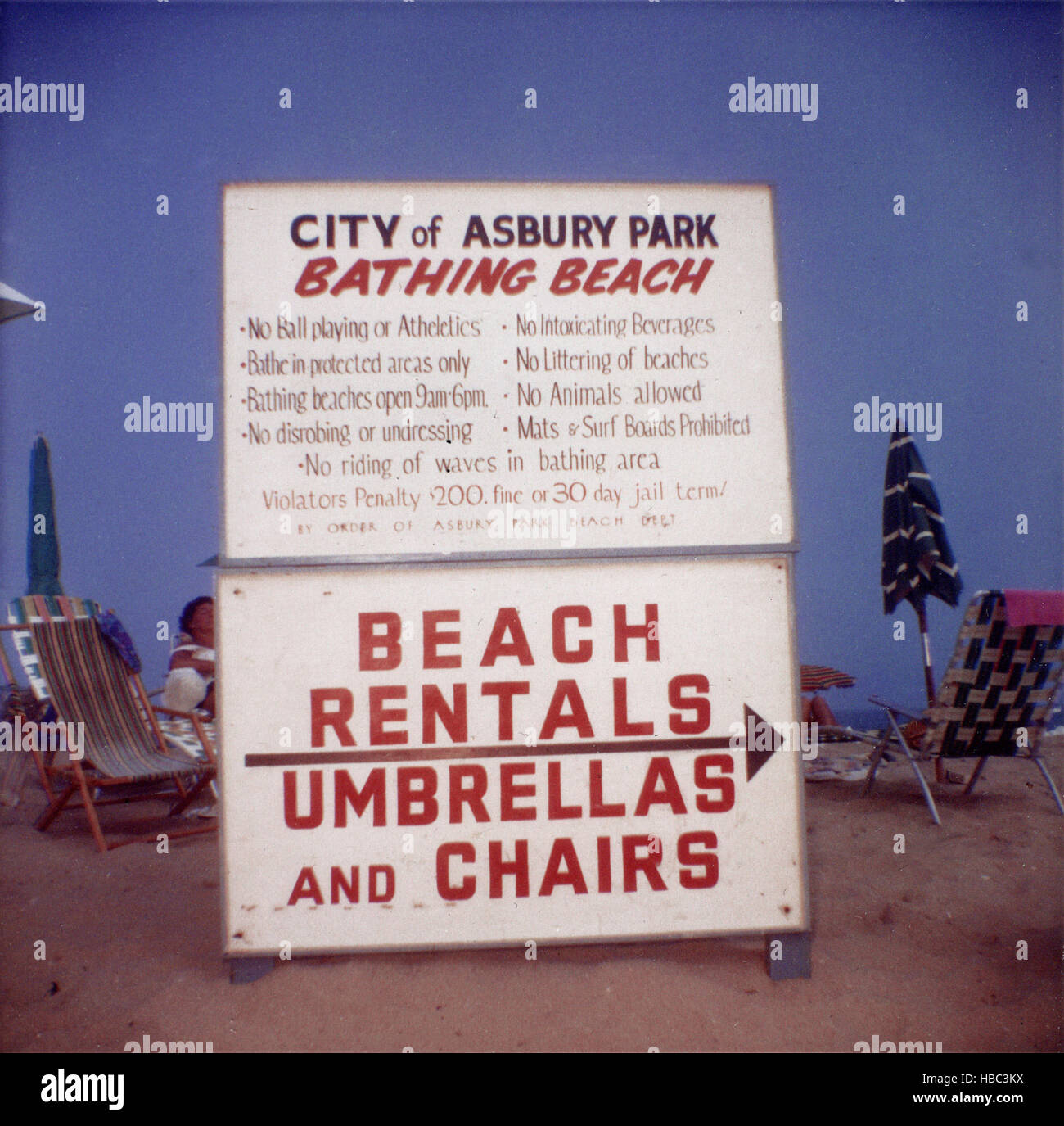 Asbury Park, sign announcing rules of the beach and umbrella and chair