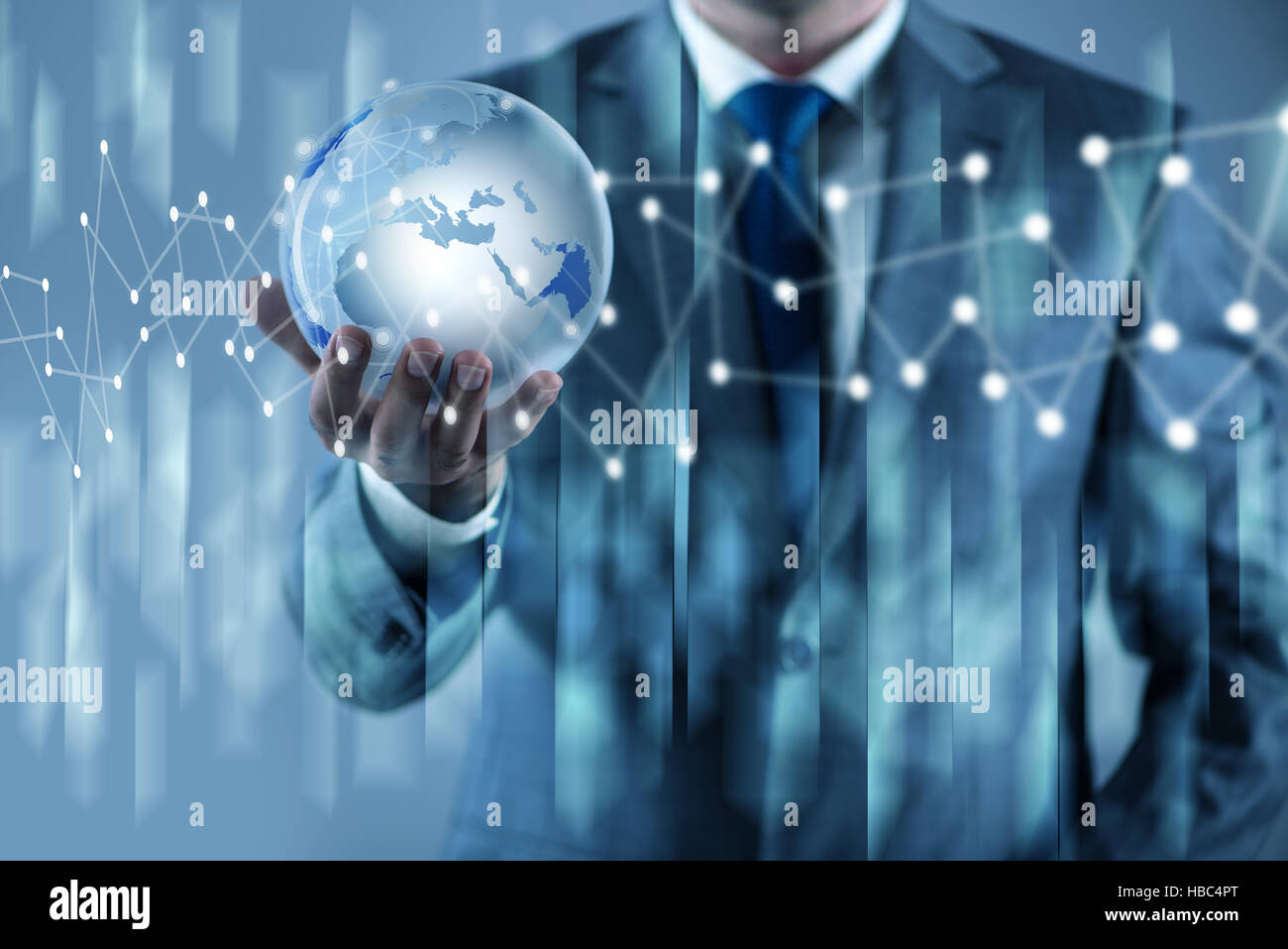 Businessman holding earth in global concept Stock Photo - Alamy