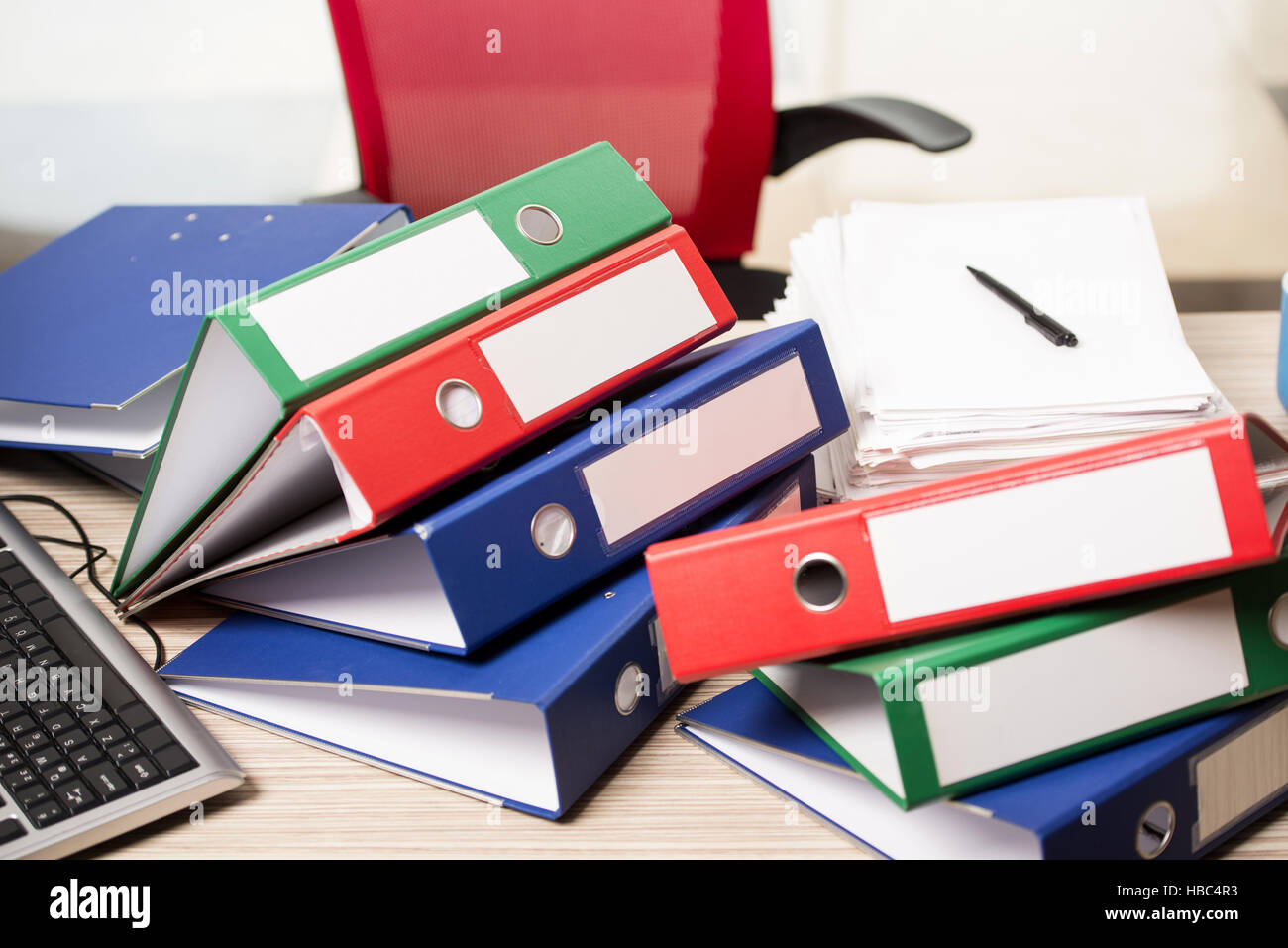 Stacks of office binders on desk Stock Photo Alamy