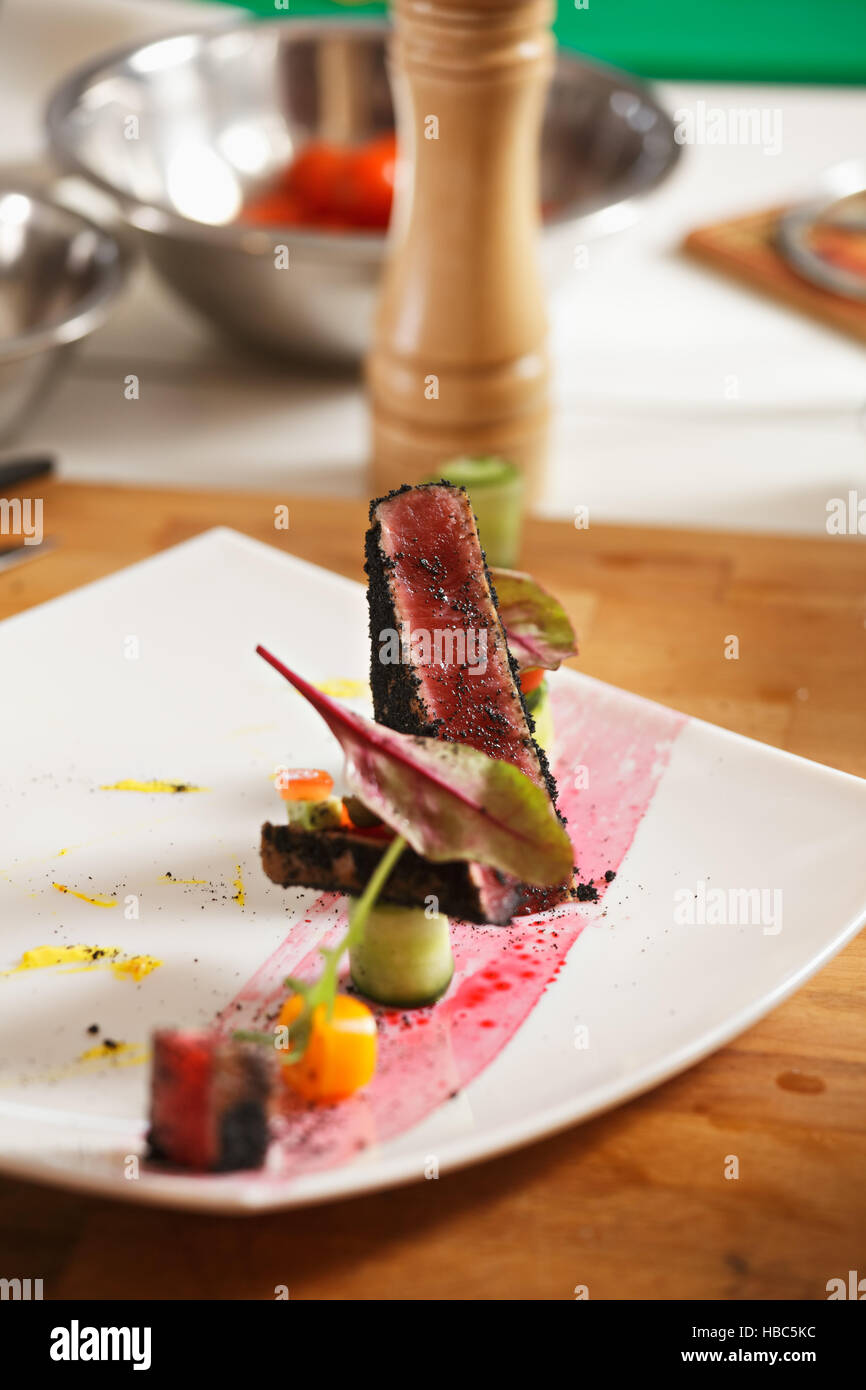 Black tuna on the plate Stock Photo