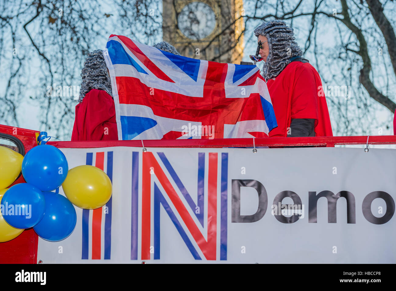 London, UK. 5th Dec, 2016. Remain campaigners dressed as Judges make their point from a bus and with an ad van - The Supreme Court starts its hearing on the case for the Government using the Royal Prerogative to trigger Article 50 of the Lisbon Treaty, in order to start the UK’s withdrawal from the EU. Against the Government are Gina Millar and her team backed by Charlie Mullins of Pimlico Plumbers. They believe that such powers are not meant to be used where they would ‘frustrate or substantially undermine’ laws made by parliament. Credit:  Guy Bell/Alamy Live News Stock Photo
