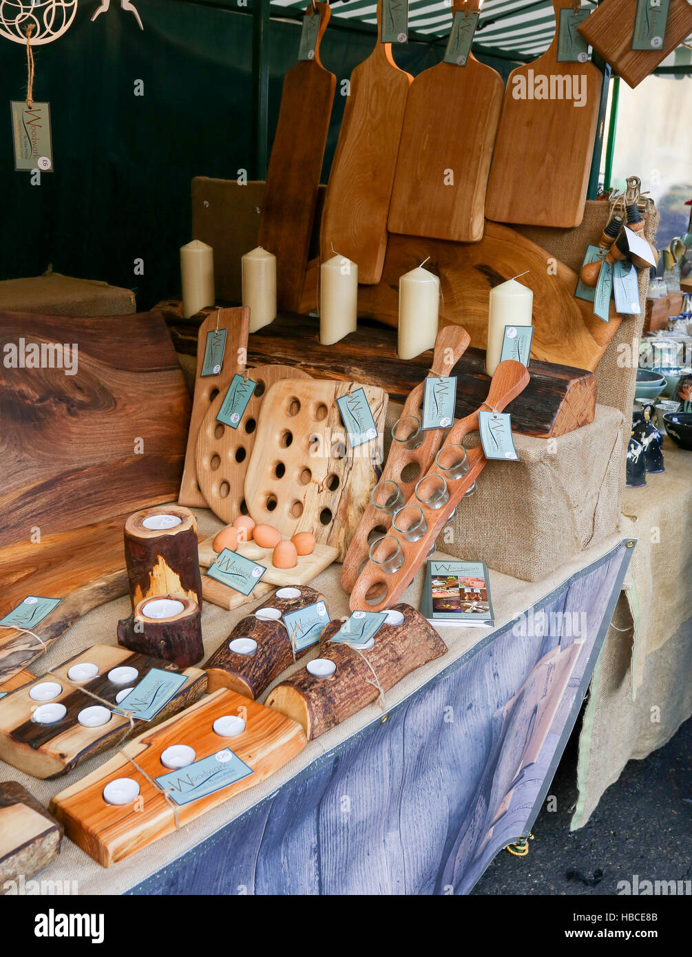 Broad Street, Oxford, United Kingdom, December 04, 2016: Arts and Crafts Market with open stalls on Broad Street stall with wood chopping boards, Oxford. Stock Photo