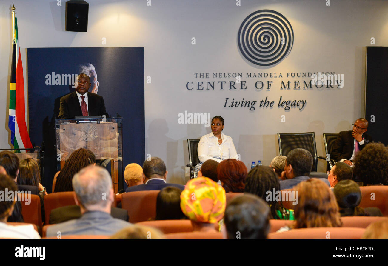 Johannesburg, South Africa. 5th December, 2016. South African Vice President Cyril Ramaphosa (L) speaks during an event commemorating the third anniversary of former South African president Nelson Mandela's death in Johannesburg, South Africa. South Africans on Monday marked the 3rd anniversary of former president Nelson Mandela's death, vowing to honour his legacy by upholding his values and principles. Credit:  Zhai Jianlan/Xinhua/Alamy Live News Stock Photo