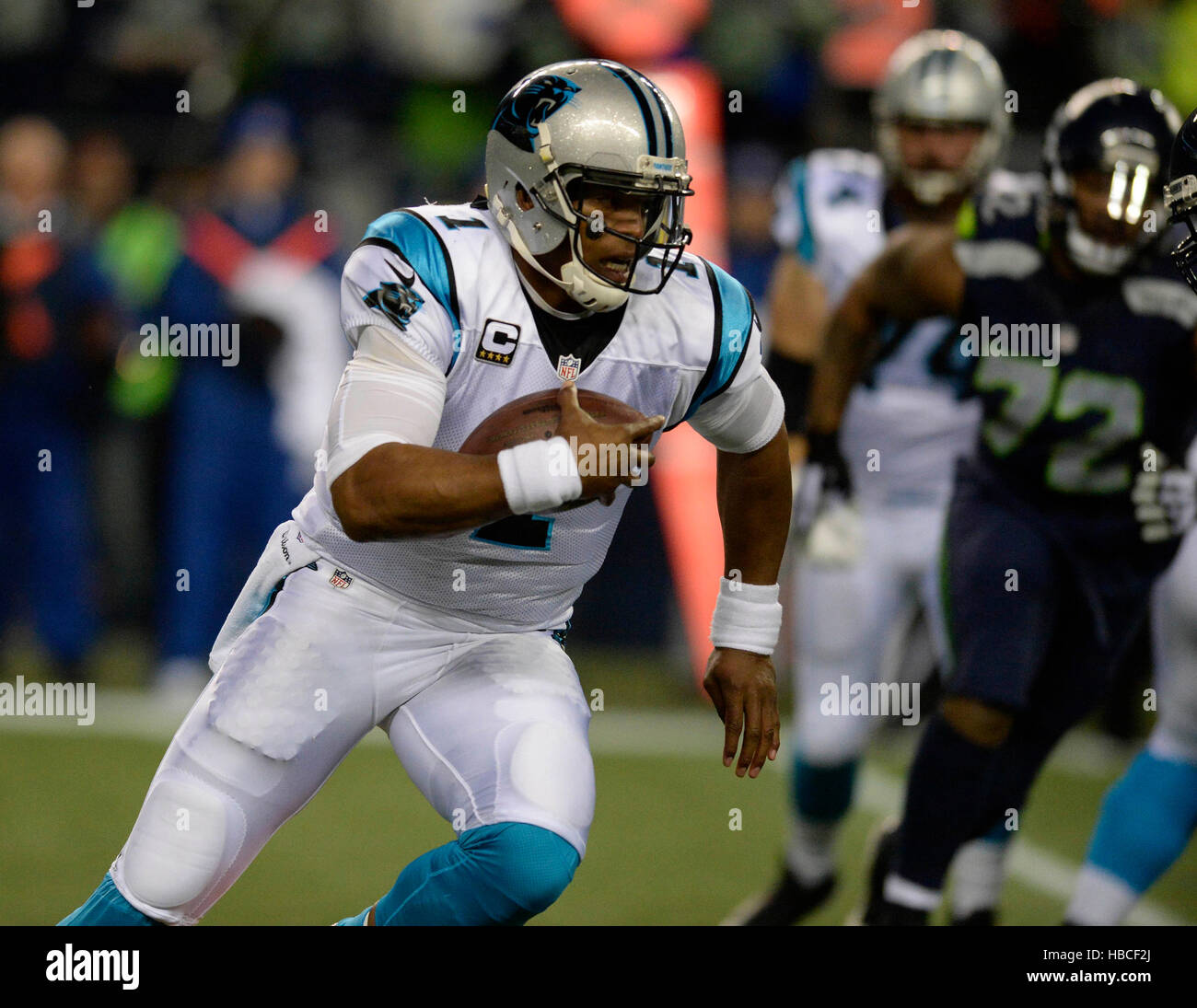Seattle, USA. 4th December, 2016.  Carolina Panthers quarterback Cam Newton (1) runs upfield against the Seattle Seahawks in the first half at CenturyLink Field in Seattle. © Action Plus Sports Images/Alamy Live News Stock Photo