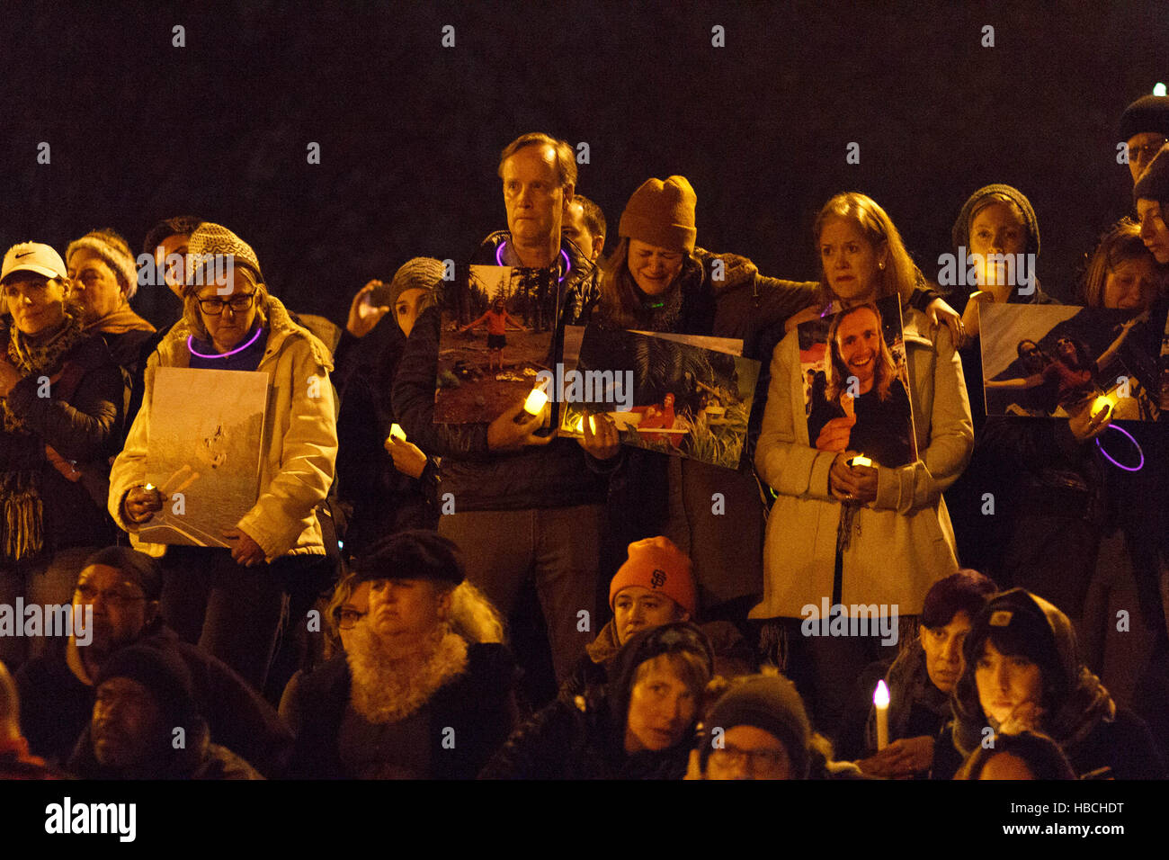 Oakland, USA. 05th Dec, 2016. People held pictures of children and loved ones at a candle light vigil for victims of the Ghost Ship warehouse fire in Oakland, CA. Credit:  John Orvis/Alamy Live News Stock Photo