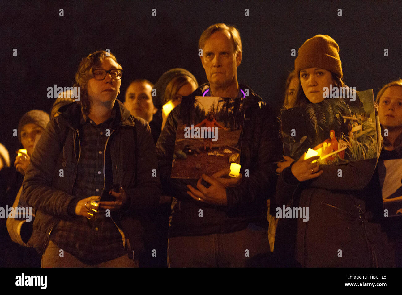 Hundreds gather for a candle light vigil at Lake Merritt in honor of victims of the fire at Ghost Ship artist warehouse in Oakland, CA. Credit:  John Orvis/Alamy Live News Stock Photo