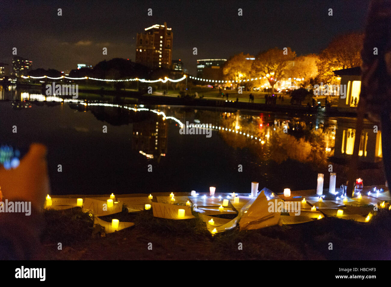 Oakland, USA. 05th Dec, 2016. Hundreds gathered at Lake Merritt for a candle light vigil for victims of the Ghost Ship warehouse fire. Oakland, CA. Credit:  John Orvis/Alamy Live News Stock Photo