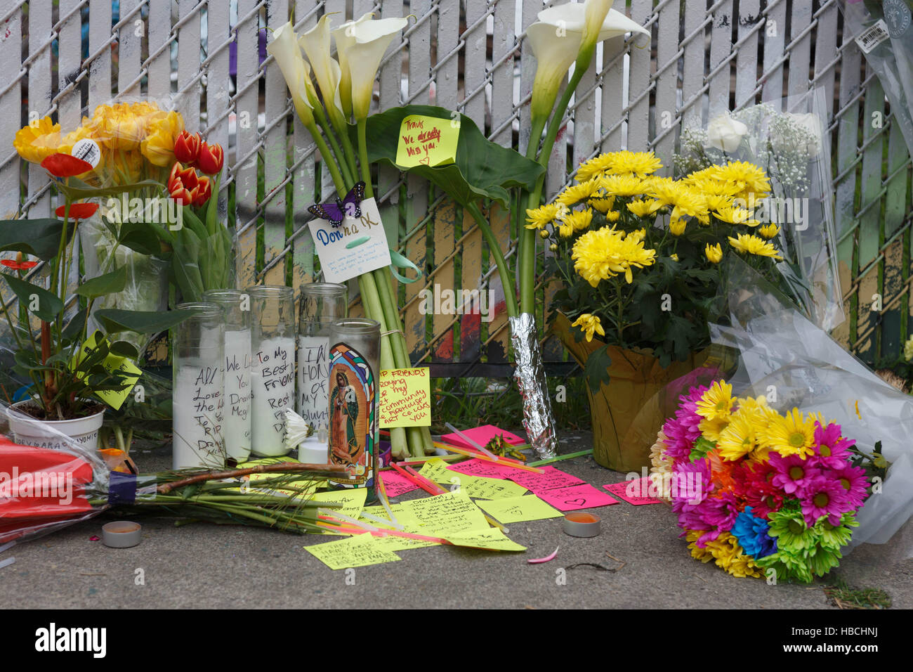 Oakland, USA. 05th Dec, 2016. A makeshift memorial outside the Ghost Ship warehouse, which burned last Friday. 33 people have been recovered from the rubble so far. Credit:  John Orvis/Alamy Live News Stock Photo
