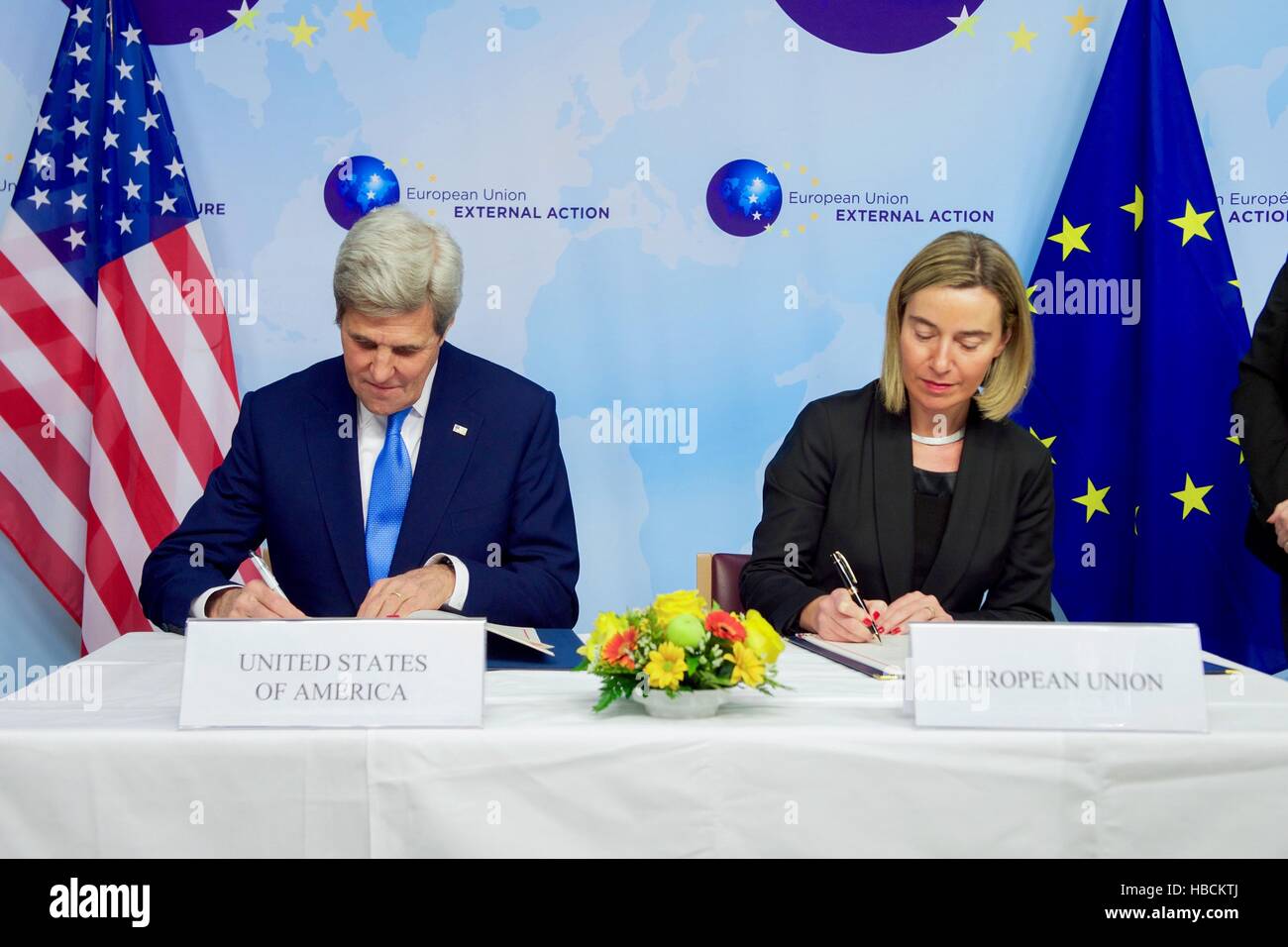Brussels, Belgium. 6th Dec, 2016. U.S Secretary of State John Kerry and European Union High Representative Federica Mogherini sign the U.S.-E.U. Acquisition and Cross-Servicing Agreement at the European External Action Service Headquarters December 6, 2016 in Brussels, Belgium. Credit:  Planetpix/Alamy Live News Stock Photo