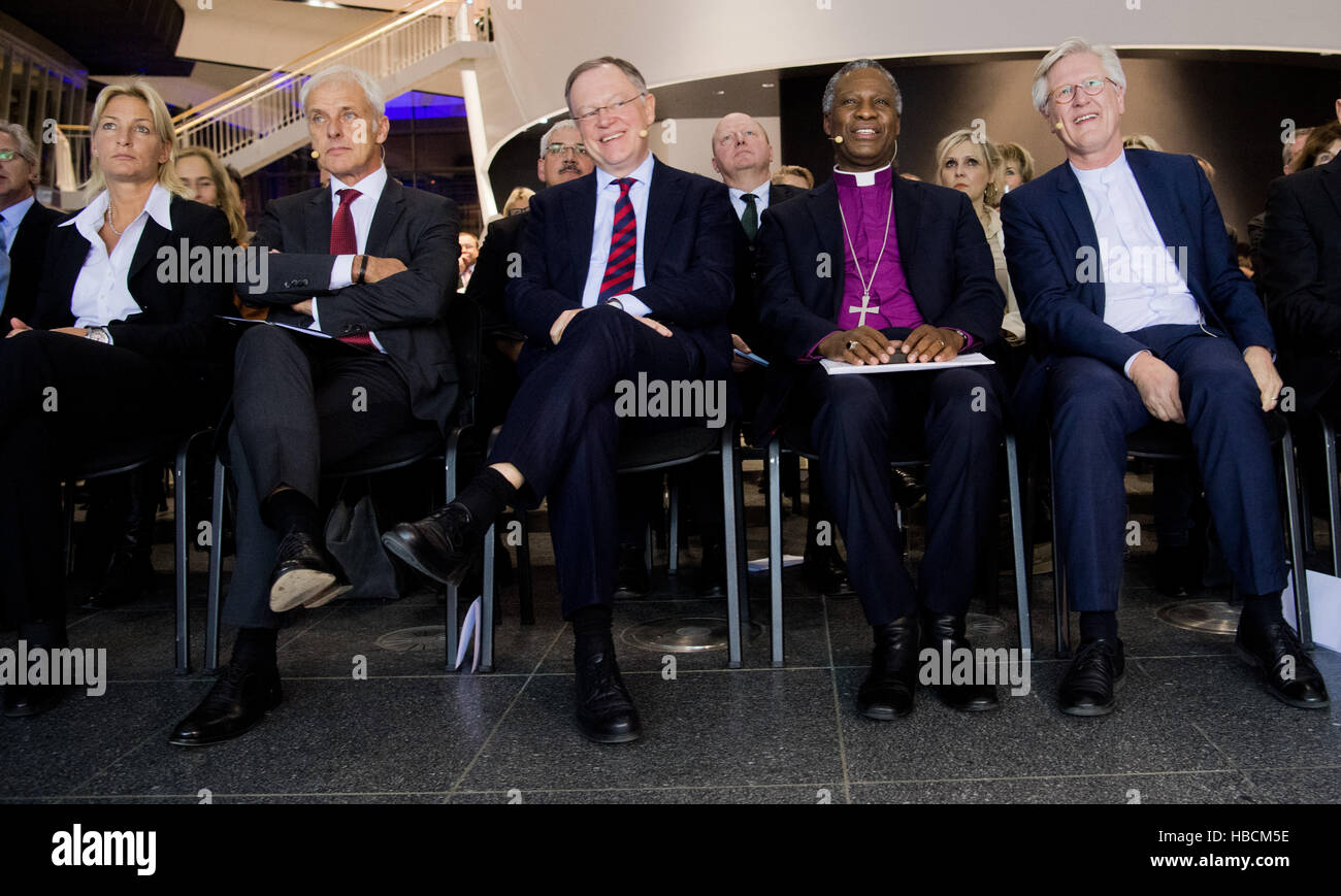 Matthias Mueller (2-L), Chairman of Volkswagen AG, his wife Barbara Rittner (L), The Premier of Lower Saxony Stefan Weil (C), the archbishop of Cape Town Thabo Makgoba (2-R), and Heinrich Bedford-Strohm, Chairman of the Council of the Evangelical Church of Germany (EKD) at a discussion forum sponsored by the Evangelical Church of Hanover in the car-manufacturing city of Wolfsburg. Germany, 06 December 2016. Representatives from the fields of politics, economy and religious convened to discuss the topics of work and vocation under the title 'Co-Creator Human: Rediscovering Work'. Photo: Julian Stock Photo
