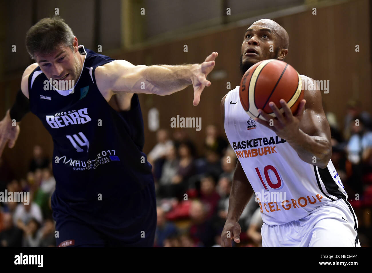 Nymburk, Czech Republic. 06th Dec, 2016. From left: Chris Christoffersen of Aarhus and Eugene Lawrence of Nymburk in action during the Men's Basketball Champions League group 8th round game: Nymburk vs Aarhus in Nymburk, Czech Republic, December 6, 2016. © Josef Vostarek/CTK Photo/Alamy Live News Stock Photo