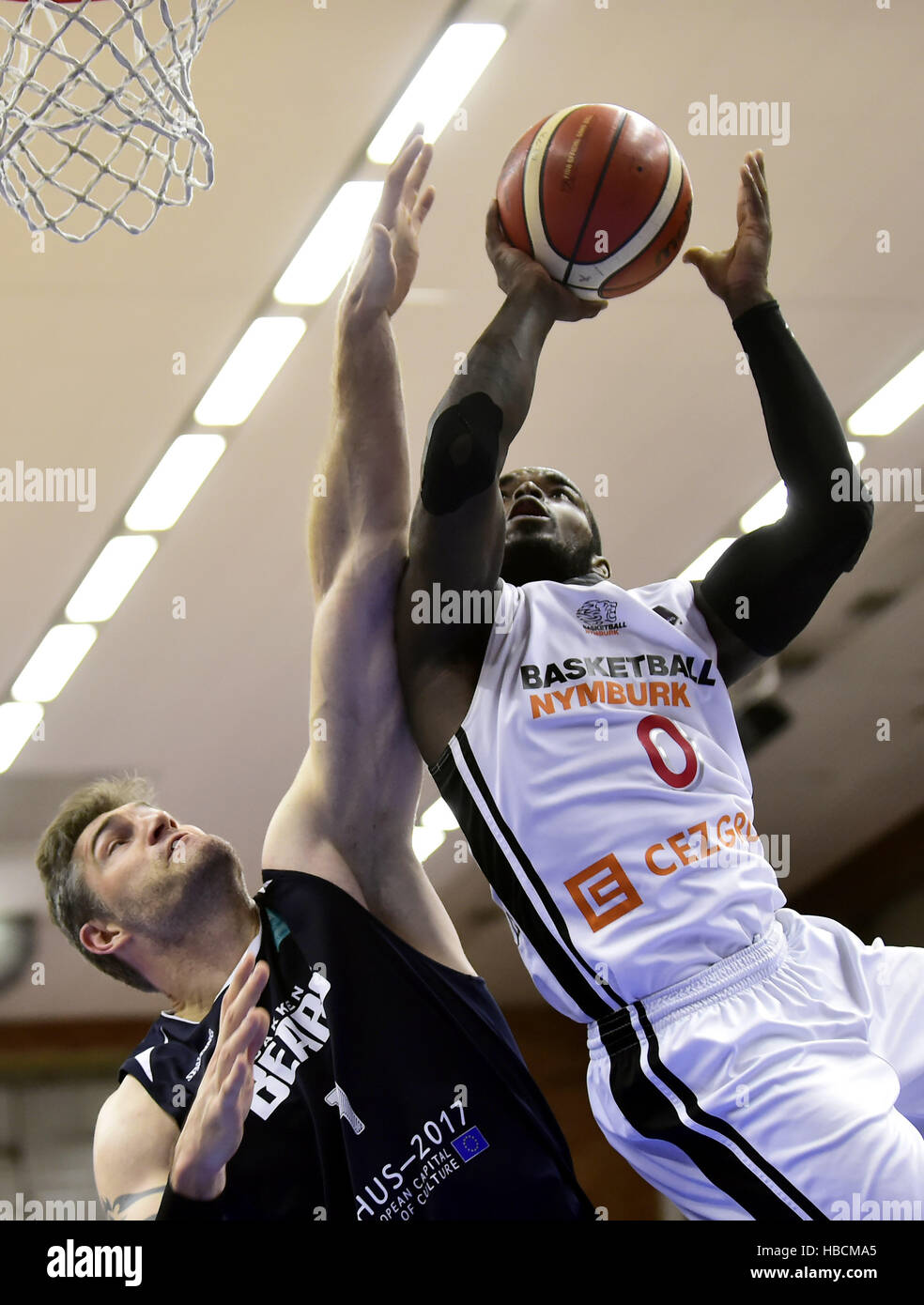 Nymburk, Czech Republic. 06th Dec, 2016. From left: Chris Christoffersen of Aarhus and Bryon Allen of Nymburk in action during the Men's Basketball Champions League group 8th round game: Nymburk vs Aarhus in Nymburk, Czech Republic, December 6, 2016. © Josef Vostarek/CTK Photo/Alamy Live News Stock Photo