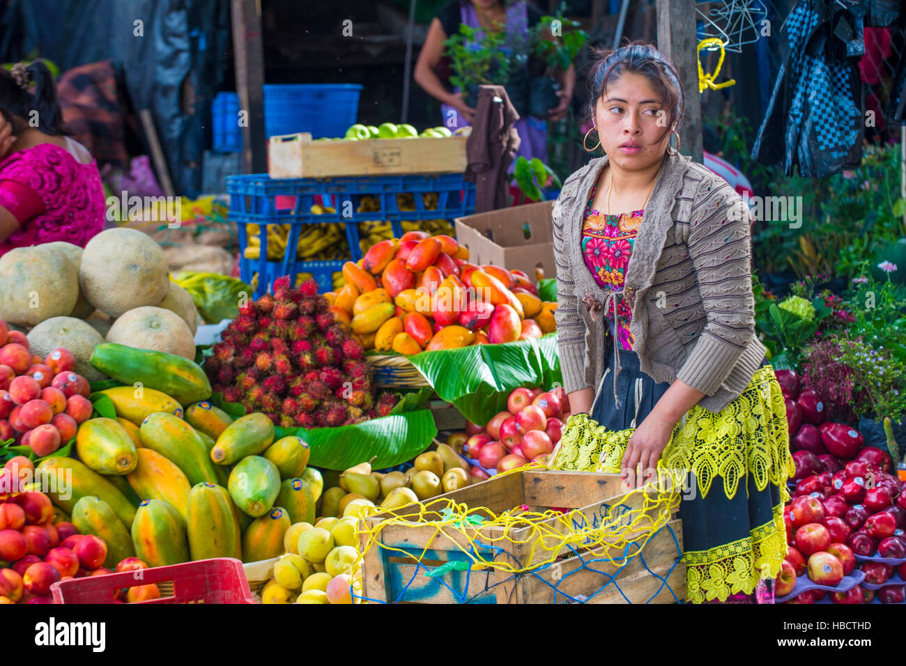 Guatemalan woman Sells fruits at the Chichicastenango Market. This native  market is the most colorful in Central America Stock Photo - Alamy