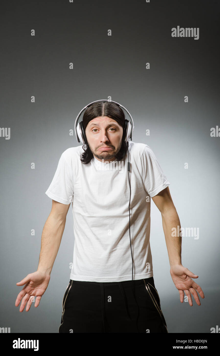 young-man-with-headphones-in-dj-concept-stock-photo-alamy