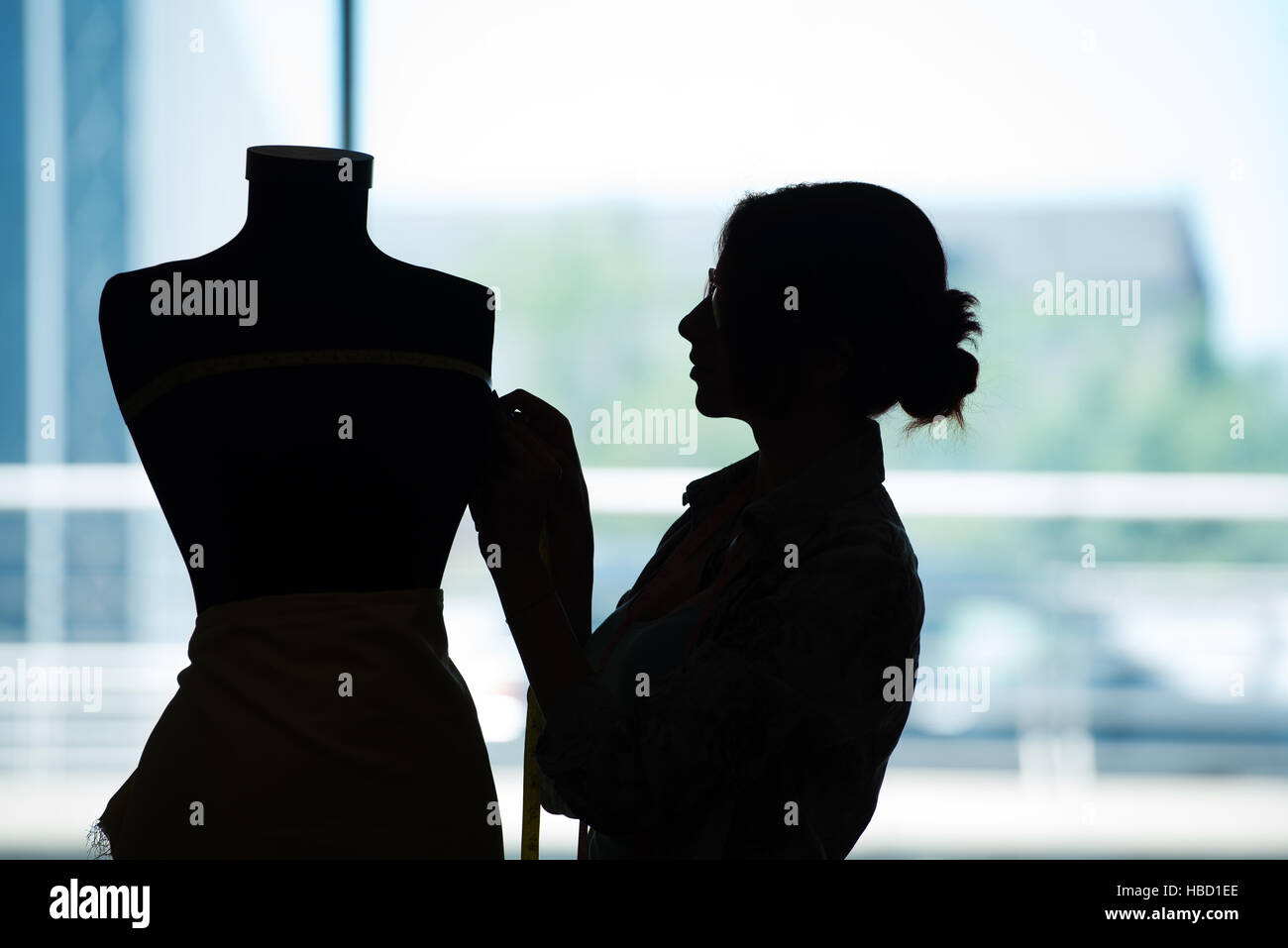 Young woman tailor isolated hi-res stock photography and images - Alamy