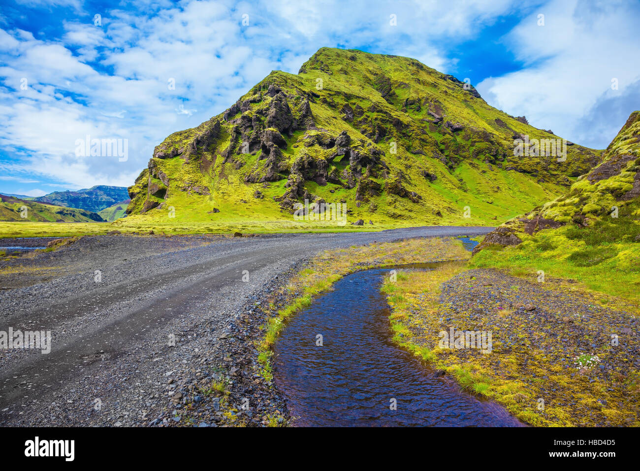 Picturesque hills covered with green grass Stock Photo Alamy
