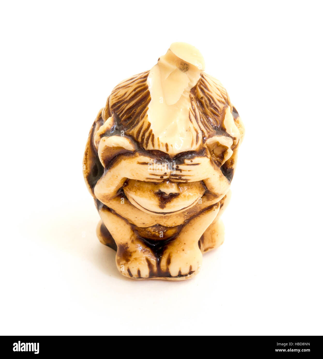 Japanese netsuke Three wise monkeys, sometimes called the three mystic apes, are a pictorial maxim. Stock Photo